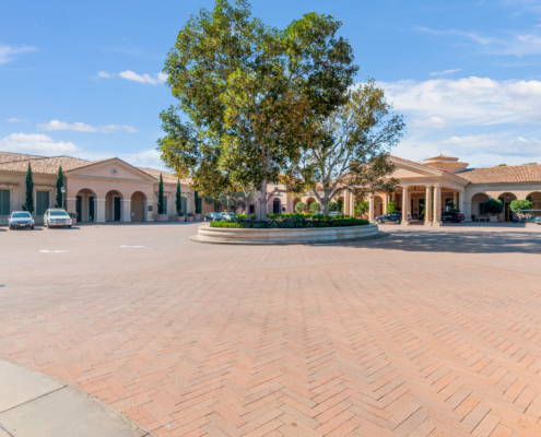 extra wide shot of pelican hill resort and spa entrance exterior