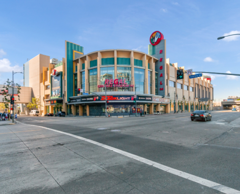 Regal Cinema building exterior wide shot from itnersection